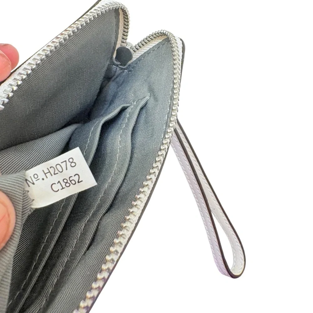 Coach white snowflake signature Wristlet bag